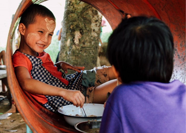 Two young Burmese refugees living in a remote mountain camp in Thailand. Photo courtesy of Isaiah Rustad, Unsplash.
